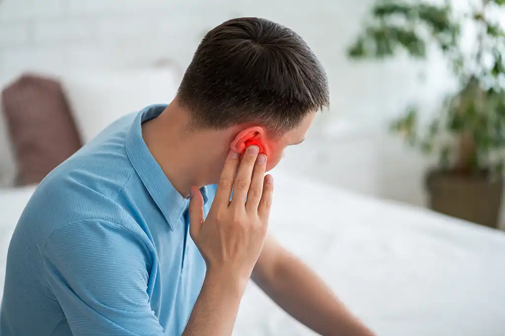 man with an ear ache