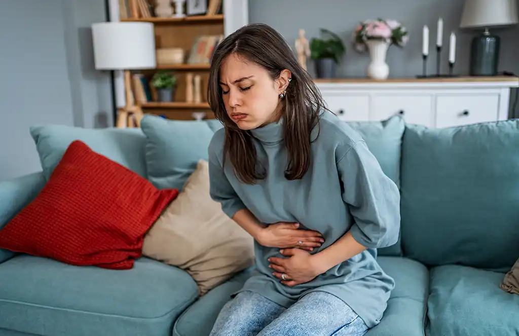 woman having stomach cramps